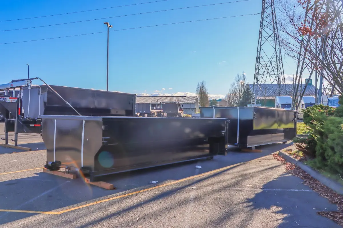 Roll-off dumpster ready for waste disposal at job site for Demolition Dumpster Rental in Orange Park